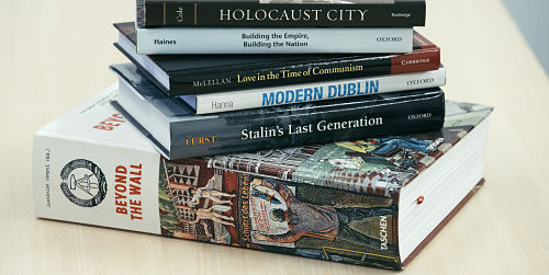 A pile of history reference books. 